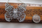 Silver Filigree Butterfly Watchworks Rainbow Crystal Necklace