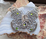 Silver Filigree Butterfly Watchworks Rainbow Crystal Necklace