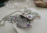 Silver Filigree Butterfly Watchworks Rainbow Crystal Necklace